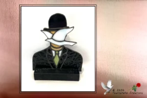 Vitrail Tiffany L'Homme au chapeau melon